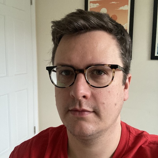 Portrait of Nate Walton looking towards the camera